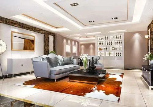 Elegant living room with blue ottoman